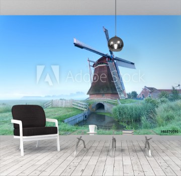 Bild på Dutch windmill in morning